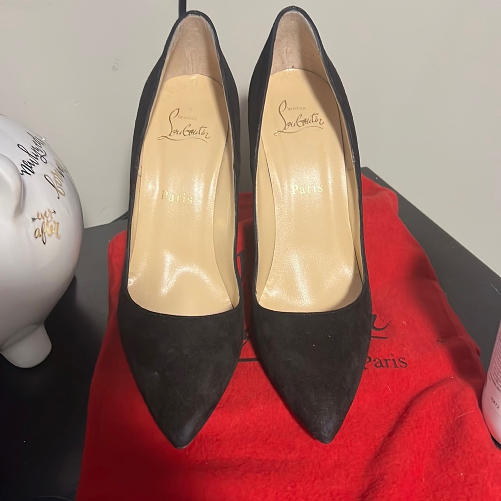 Christian Louboutin red bottoms size 9